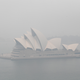 The Sydney Opera House enveloped in smoke.